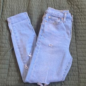 Levi’s wedgie distressed jeans